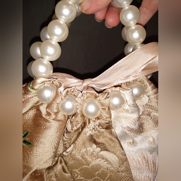 Beige embroidered beaded potli bag - Picture 3 of 5